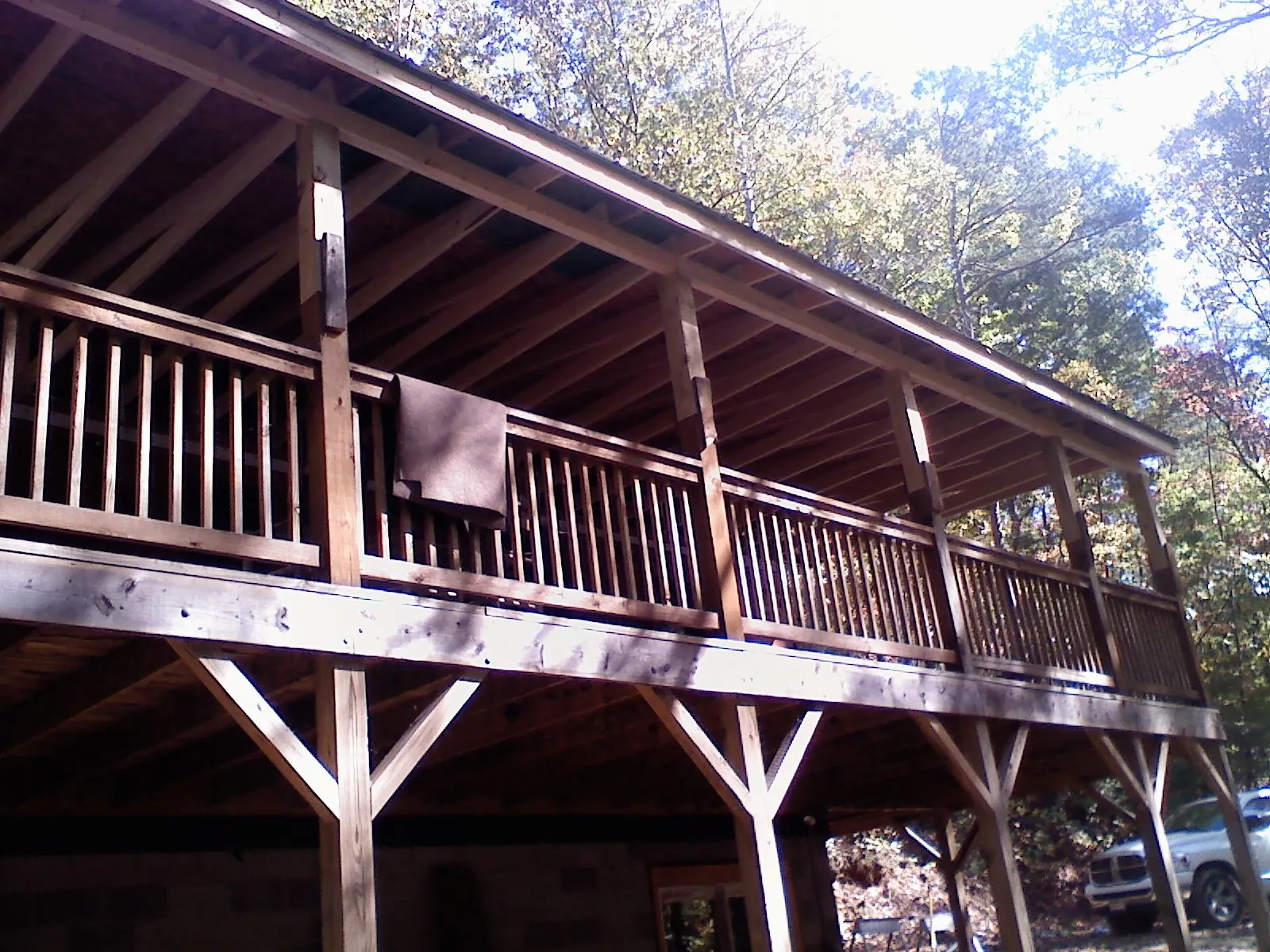 Timber framing under a new elevated porch and deck — Roof Leak Repair in Amsterdam by Roofing Brothers